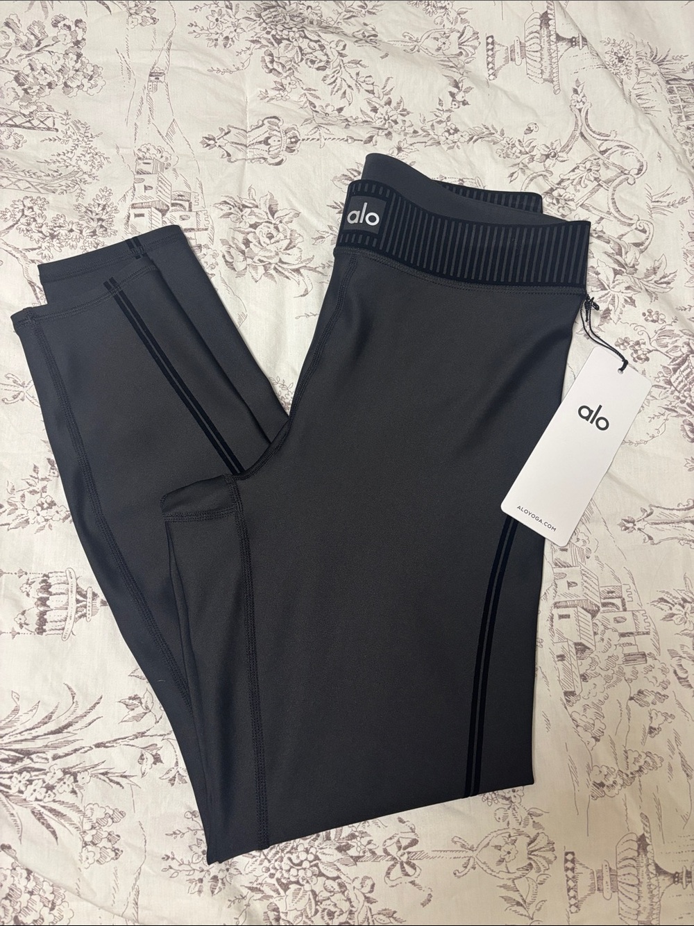 ALO Yoga Black High-Rise Airlift Leggings with Subtle Waist Stripe